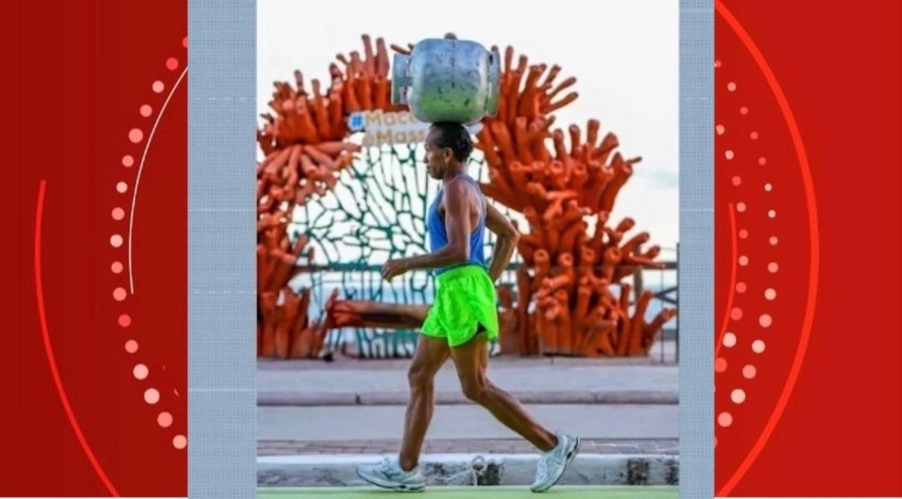 Atleta viraliza ao correr com botijão de gás na orla